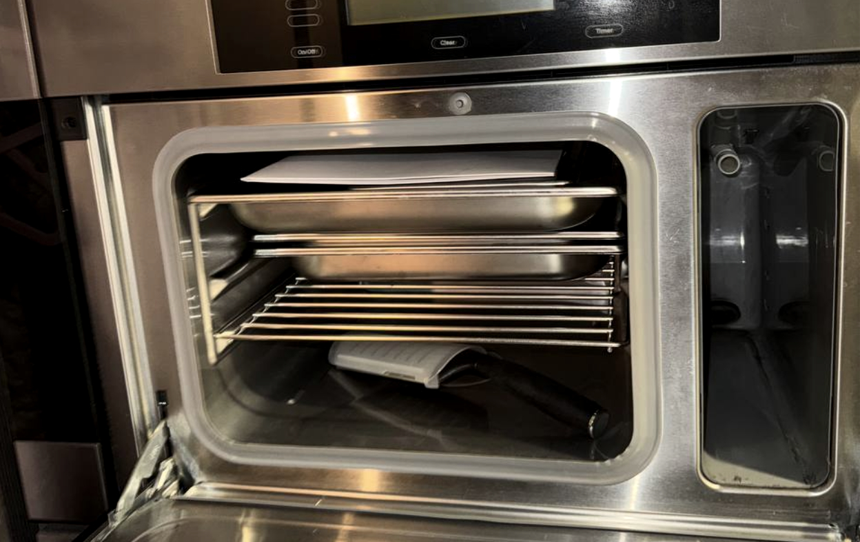 Miele built-in steam oven repair — pulled for service, steam and heat tested in Houston, TX