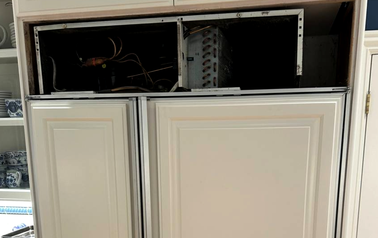 Thermador built-in refrigerator repair — top compartment opened, condenser serviced and cooling performance verified in Houston, TX